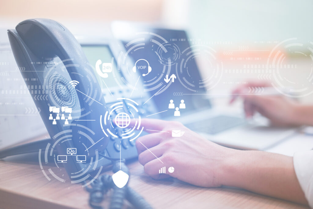 close up man hand point to press button number on telephone office desk with virtual interface effect of telecommunication hotline employee concept